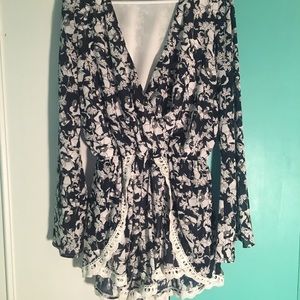 Blue and white floral romper with lace details